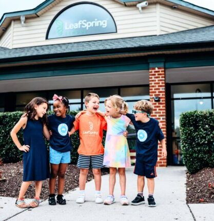 LeafSpring School students in front of school